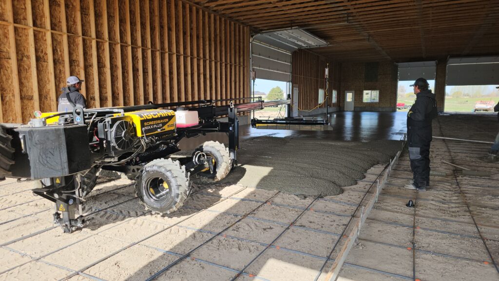 Ligchine max pro laser screed putting the mud down flat! Out Topcon laser leveling system will put down a floor perfectly level or with one way slope. We have someone chairing up rebar in front of the concrete truck and we screed behind like a beautifully choreographed dance.